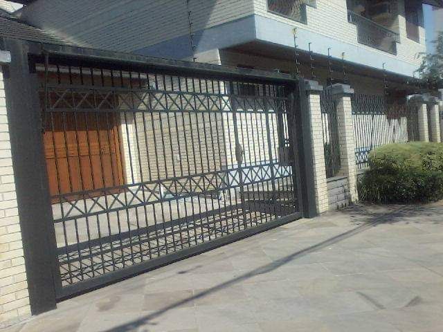 Portão de grade trabalhada